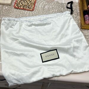 Gucci silk dust bag. 14” x 12” tall. Excellent condition/ never used.